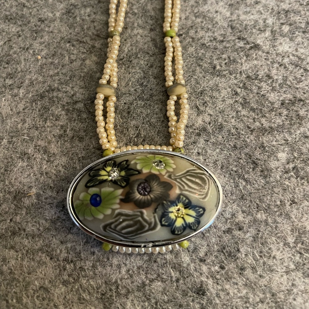 Handcrafted Pearl Necklace with Flower Decorated Pendant.